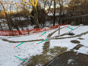 This photo was taken after a January thaw, but it illustrates the highway system I created for Muppy in the snow in our backyard.